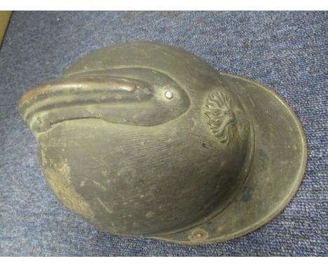 Helmet: a WW1 French Adrian Pattern 1916 steel helmet. Original paint finish with 'R.F'. flaming grenade badge. Six ear liner