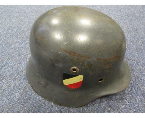 German WW2 helmet (genuine shell) with copy decals, no liner