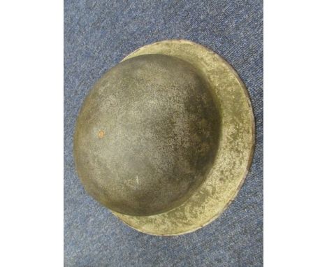 Helmet: a scarce Great War Brodie 1916 MKII Steel helmet, with original oil cloth liner and leather head pad. Complete chin s