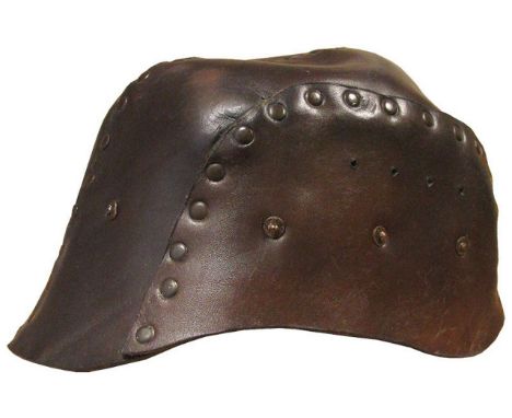 Tank Helmet: An extremely rare model 1916 leather British Tank Crew helmet. Helmet comprises 4 riveted leather sections. Leat