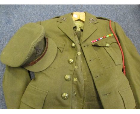 WW2 officers uniform to a Captain in the West Riding Reg consisting of 1940 pattern battle dress blouse service jacket hat sh