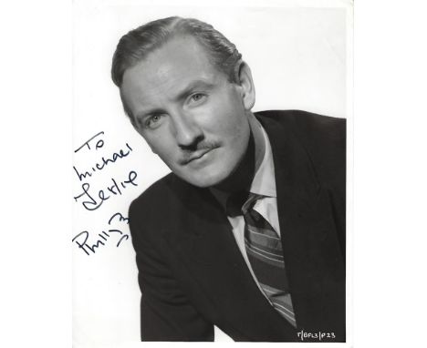 Leslie Phillips Signed photo black and white 10 x 8 inch. Dedicated To Michael. Condition report out of 10, 7. Minor creases 