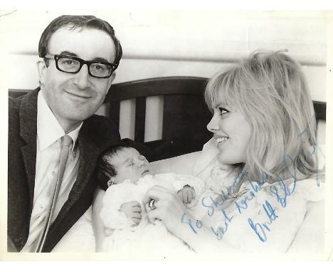 Britt Ekland Signed photo with Peter Sellers and new born baby black and white 8.5 x 6.5 inch. Dedicated To Sharon. Inscribed
