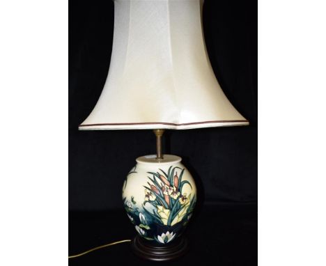 A MOORCROFT POTTERY TABLE LAMP AND SHADE  decorated in the 'Lamia Pattern' designed by Rachel Bishop, 36cm high to top of ele