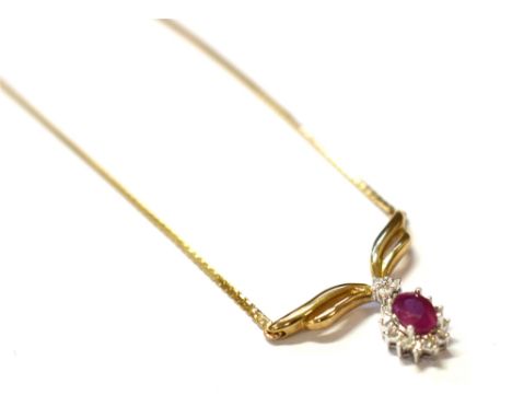 9CT GOLD RUBY &amp; DIAMOND LAVALIER 42cm long, 9ct gold zip link chain suspending an oval mixed cut ruby, estimated 0.57 car