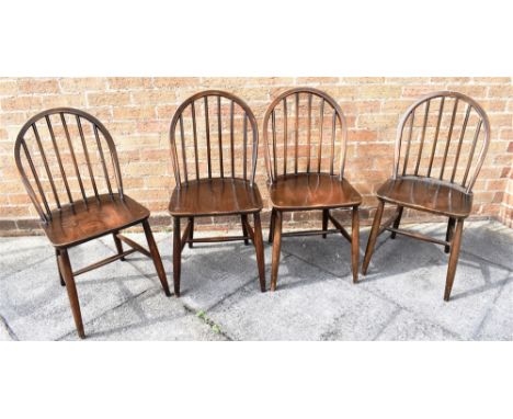 A SET OF FOUR ERCOL MODEL 400 WINDSOR DINING CHAIRS Condition Report : age related wear and tear, but solid enough Condition 