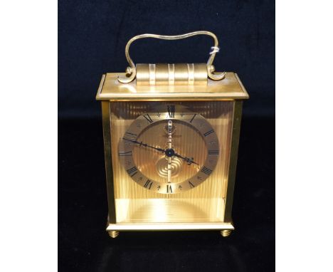 A GILT BRASS CASED JAEGER-LE-COULTRE 8-DAY SKELETON CLOCK  the chapter ring with Roman numerals, stamped to base '510', 18cm 