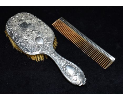EDWARDIAN SILVER BRUSH &amp; BAKELITE COMB A silver backed hairbrush depicting a bucolic scene in repousse decoration.  Hallm