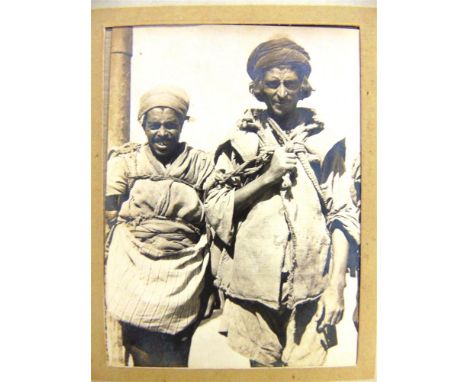 PHOTOGRAPHS - NORTH AFRICA  Twenty-four sepia images, circa 1920s, most loosely captioned, including portrait studies and str