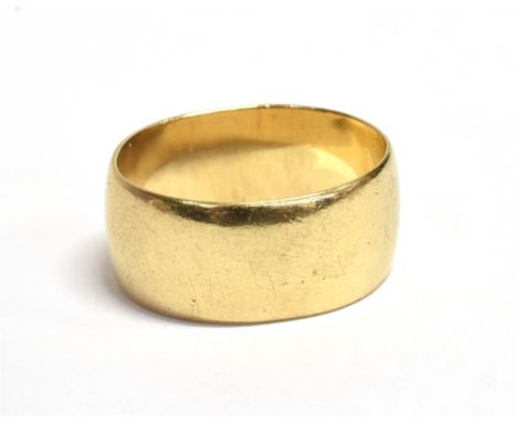 WIDE PLAIN GOLD WEDDING BAND 9.8mm wide, 9ct gold, indistinct hallmark, ring size R.  Slightly bent out of shape.  Weight 7.1