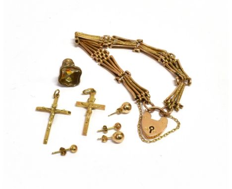 ASSORTED 9CT GOLD JEWELLERY To include a 9ct gold 18cm long fancy link gate bracelet with padlock clasp, two pairs of gold st