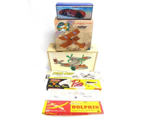 ASSORTED MODEL AIRCRAFT  comprising a Paya tinplate aircraft, boxed; a 1/32 scale Gearbox Sopwith Pup, boxed; and four unmade