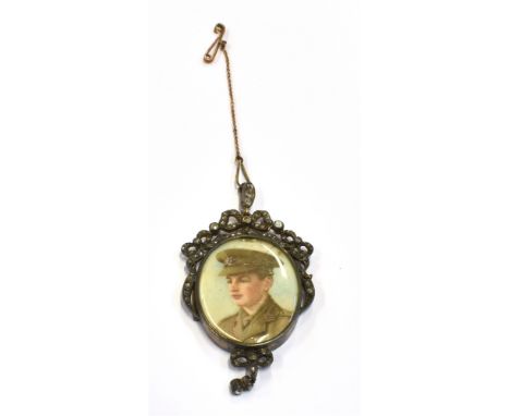 EDWARDIAN DIAMOND SET PORTRAIT LOCKET Silver gilt locket approx 6.0 x 3.2 cm, with finely painted portrait of a young man in 