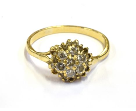 MODERN DIAMOND FLORAL CLUSTER RING 9.6mm diameter floral cluster, grain set with eight round brilliant cut diamonds approx 2.