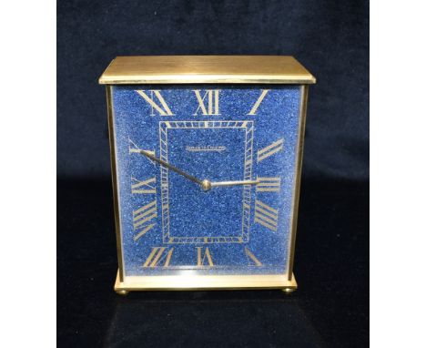 A BRASS CASED JAEGER-LE-COULTRE MANTLE CLOCK  the lapis lazuli style face with gilt Roman numerals, British Aerospace present