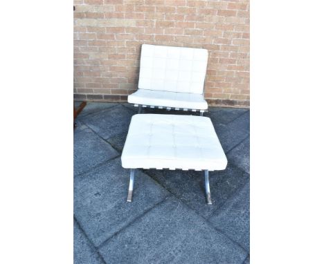 A MIES VAN DER ROHE 'BARCELONA' TYPE ARMCHAIR AND MATCHING FOOTSTOOL with white leather button upholstered cushions on a poli