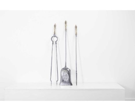 A set of three Regency brass and steel fire tools, 19th century, comprising a shovel, poker and tongs,78cm long (3)Condition 