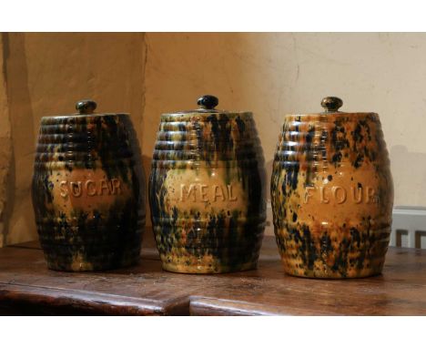 A set of three glazed earthenware storage jars and covers, 19th century, Scottish, probably by Morrison and Crawford, Rosslyn