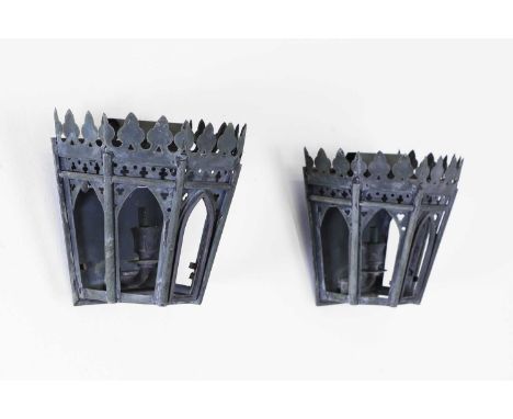 A pair of small patinated metal Gothic architectural wall lights by Charles Edwards, of recent manufacture, each with a trefo