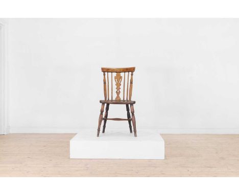 A fruitwood and elm Windsor single chair, early 19th century, Thames Valley, with a pierced urn-shaped splat above a dished s