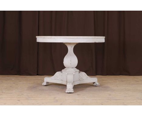 An Empire-style painted oak guéridon, 19th century, French, the white marble top raised on a hexagonal baluster column and sc