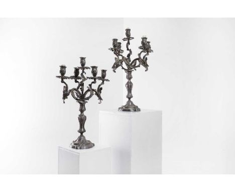 A pair of Victorian silver-plated candelabra, second half of the 19th century, each of scrolling rococo form with five branch