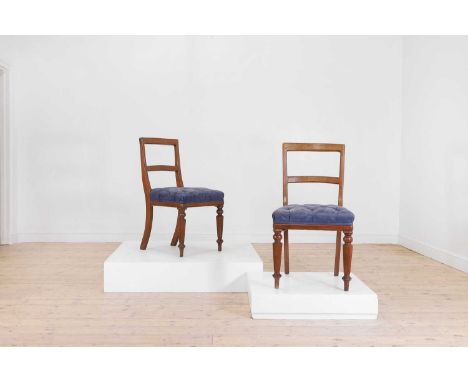 A composed set of ten Victorian golden oak dining chairs, second half of the 19th century and later, each with a chamfered ba