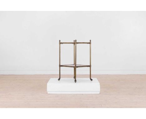 A Regency-style kingwood and brass étagère, early 20th century, each shelf quarter-veneered with a strung and crossbanded bor