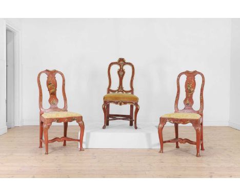 A pair of red and gilt-japanned side chairs, 18th century and later, possibly Dutch, each with a pierced fiddle back and a se