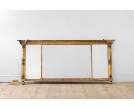 A George IV giltwood overmantel mirror,  c.1830, of inverted breakfront form, with a stepped cornice and foliate column pilas