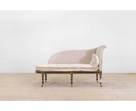 A Regency-style simulated rosewood chaise longue, late 19th century, with a high back and arm, raised on tapering ring-turned