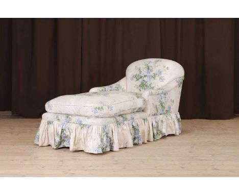 An upholstered chair-back chaise longue in the style of Howard & Sons, 20th century, by Kingcome, with a high back and scroll
