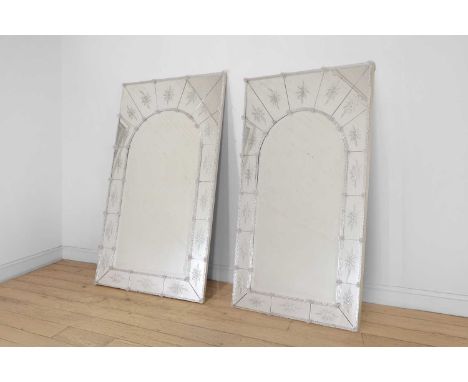 A pair of Venetian etched and moulded glass mirrors, of recent manufacture, each with an arched central plate within a segmen