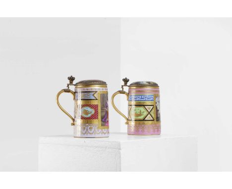 A pair of Vienna porcelain and gilt-metal-mounted tankards, c.1815-1820, each of tapering cylindrical form with a gilt reserv