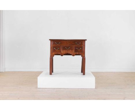 A George II mahogany lowboy, 18th century, the moulded rectangular top over one long and three short drawers with brass pull 