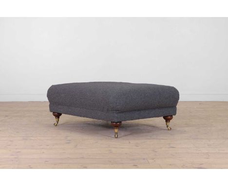 An upholstered footstool by Parker Knoll, of recent manufacture, the rectangular top with a grey wool covering, raised on tur