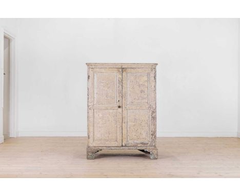 A painted pine cupboard, late 18th/early 19th century, the rectangular top above a pair of panelled doors enclosing shelves, 