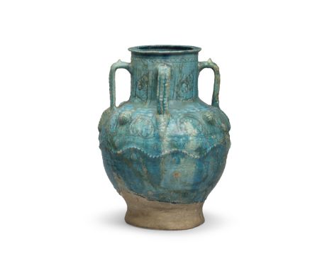A large Kashan monochrome pottery jar Persia, 12th Centuryof globular form on a splayed foot with cylindrical neck, everted r