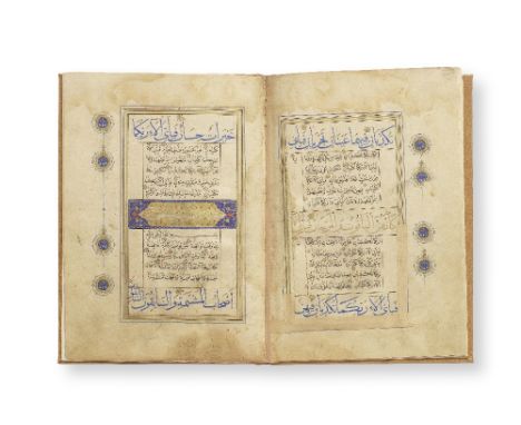 An illuminated Qur'an section Persia, 16th CenturyArabic manuscript on paper, 14 leaves, 13 lines to the page, first and last