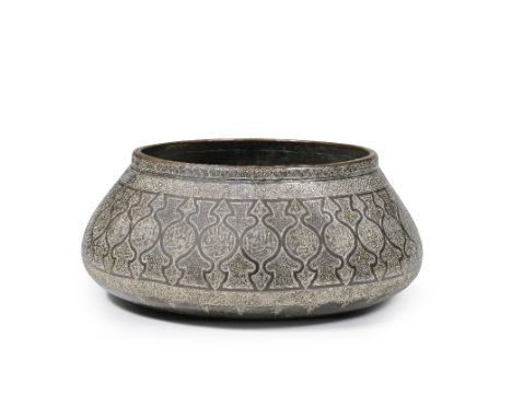 A silver-inlaid brass bowl Egypt or Syria, 20th Centuryof deep rounded form, the sides tapering towards a short vertical rim,