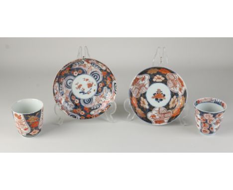 Two antique Chinese Imari porcelain chocolate cups + saucers. Chips + hairlines. Dimensions: 8 - Ø 15 cm. In decent shape.