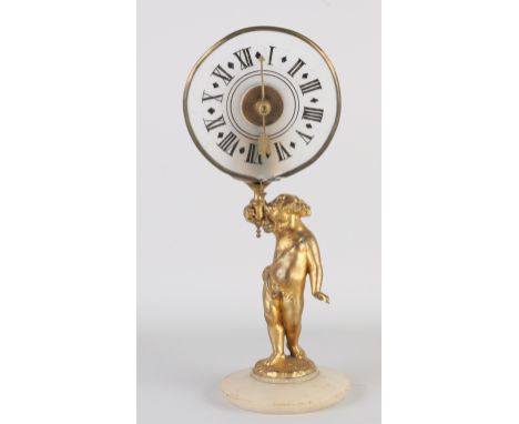 Antique French night light mantel clock. Composition metal, gold plated. With putti and alabaster base. Circa 1880. Dimension