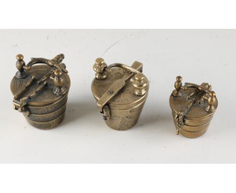 Three bronze closing weights. After an ancient example. Dimensions: 8 - 10 cm. In good condition.