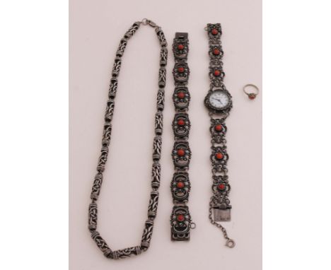 Lot of silver jewellery, 835/000, with a watch, bracelet and a children's ring with red coral and a necklace with cylindrical