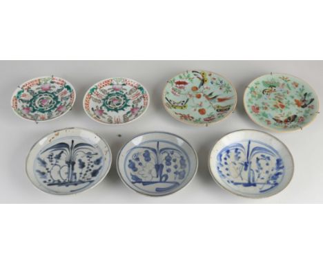 Seven various antique Chinese porcelain saucers. Some hairline or chip. Dimensions: Ø 13 - 15 cm. In fair/good condition.