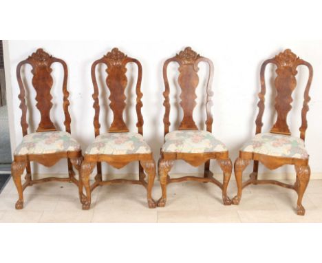 Four antique Dutch burr walnut baroque-style/Chippendale-style chairs. Floral carving + claw feet. Circa 1900. Dimensions: 12