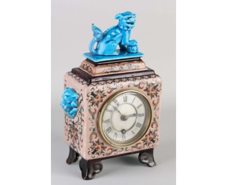 19th century French ceramic chinoiserie table clock. J. Vieillard &amp; Co. With foo dog. Damages. Eight-day silent movement.