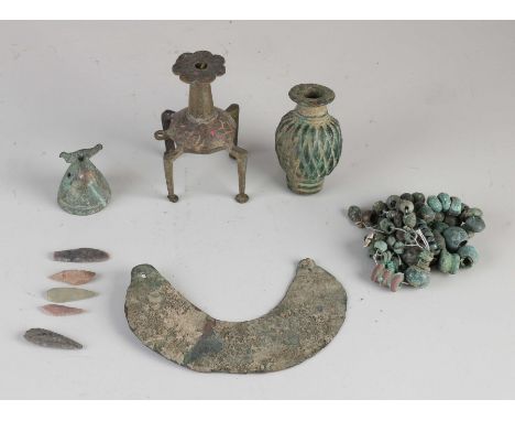 Lot of bronze artefacts Luristan. Among other things; carved club, breast plate, cosmetics holder, flints, arrowheads, neckla