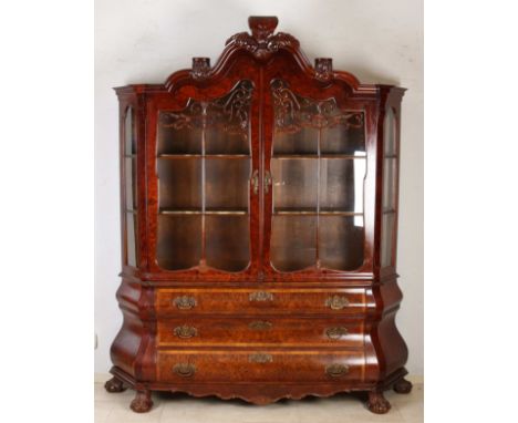 Dutch burr walnut display cabinet with bronze fittings and claw feet. Baroque style. Style furniture. Second half of the 20th