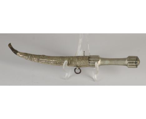 Ancient oriental crooked dagger. plate. Floral edited. First half 20th century. Dimensions: L 37 cm. In good condition.